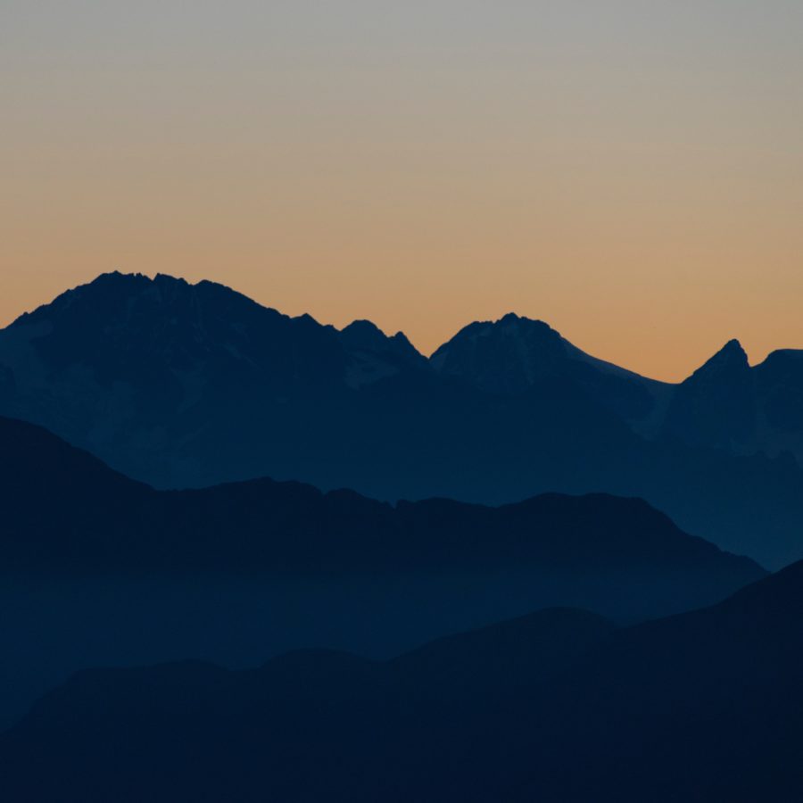A mountain range at sunset
